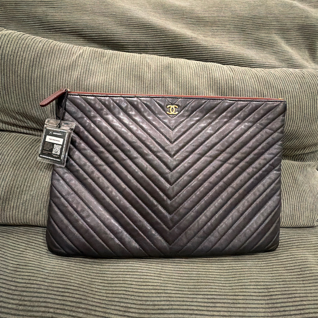Chanel V-Stitch Lambskin Zip Clutch