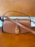 Smooth Calfskin Tabou Clutch On Strap