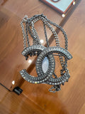 Chanel ruthenium strass and chain CC brooch.