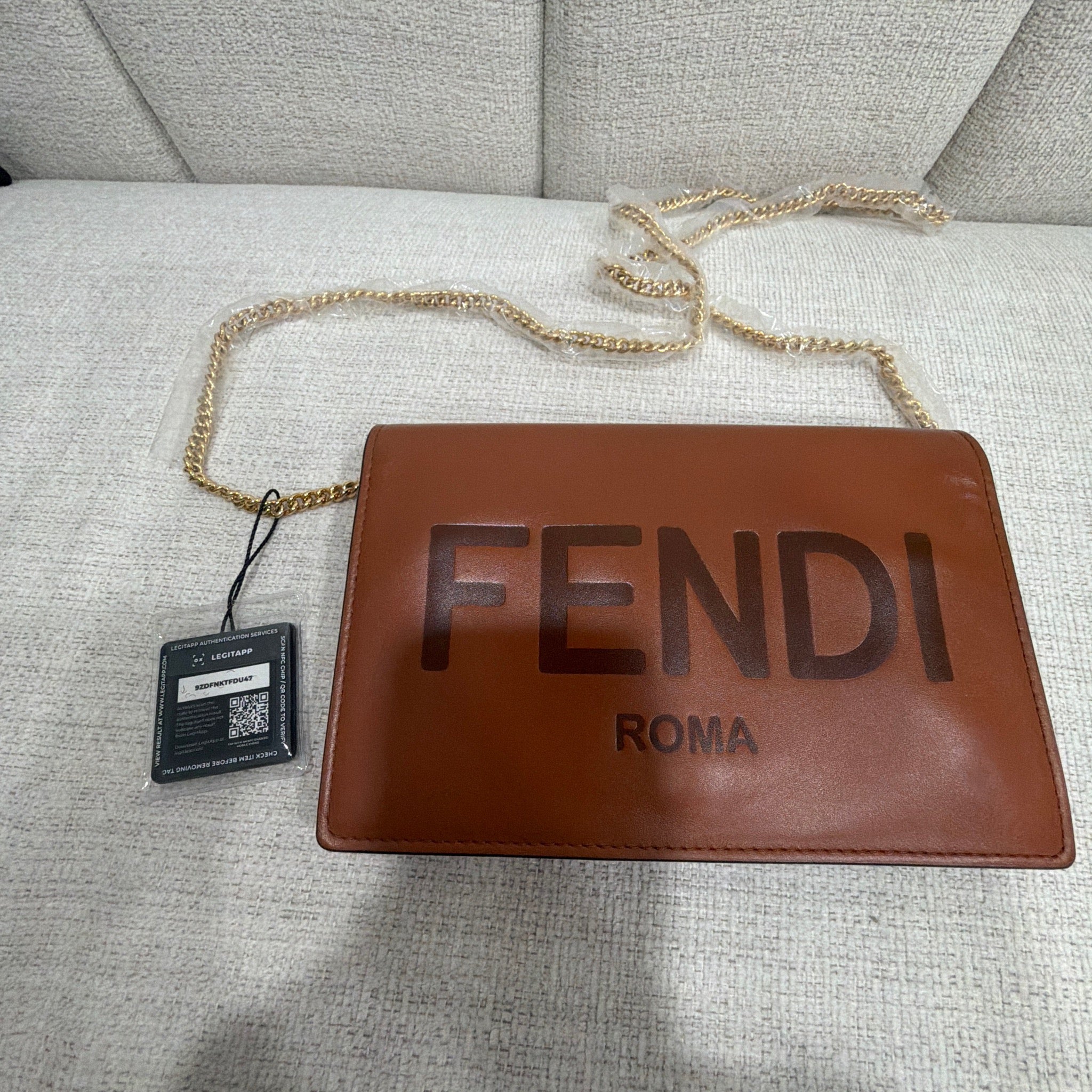 Fendi Vitello King Tamponato Logo Embossed Wallet On
Chain