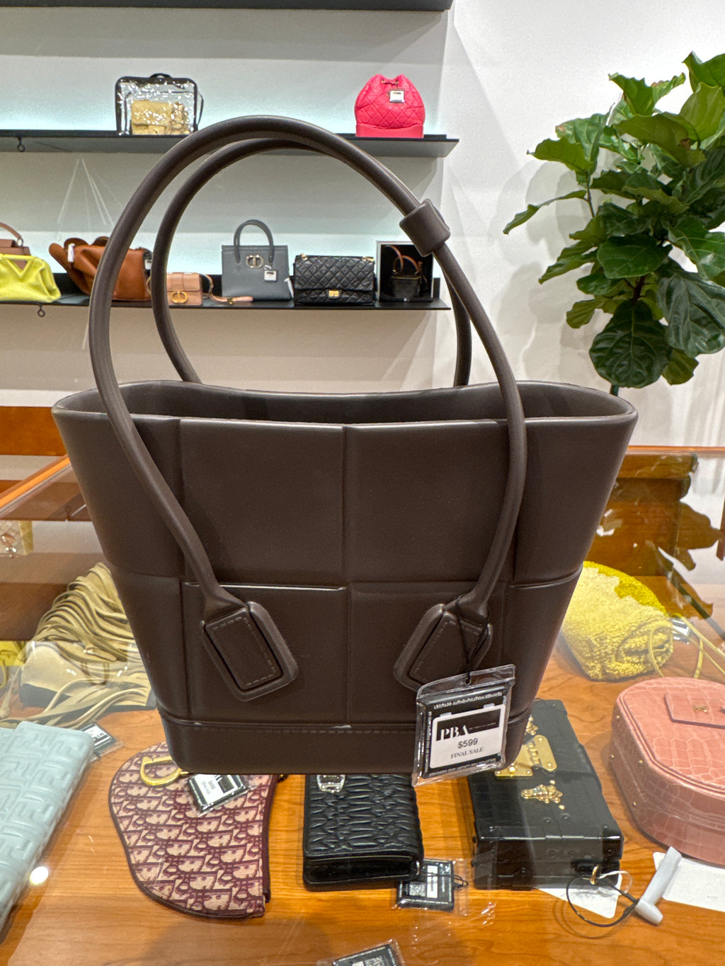 BOTTEGA VENETA
Brown Maxi Intrecciato Woven Rubber Mini Arco Tote Bag