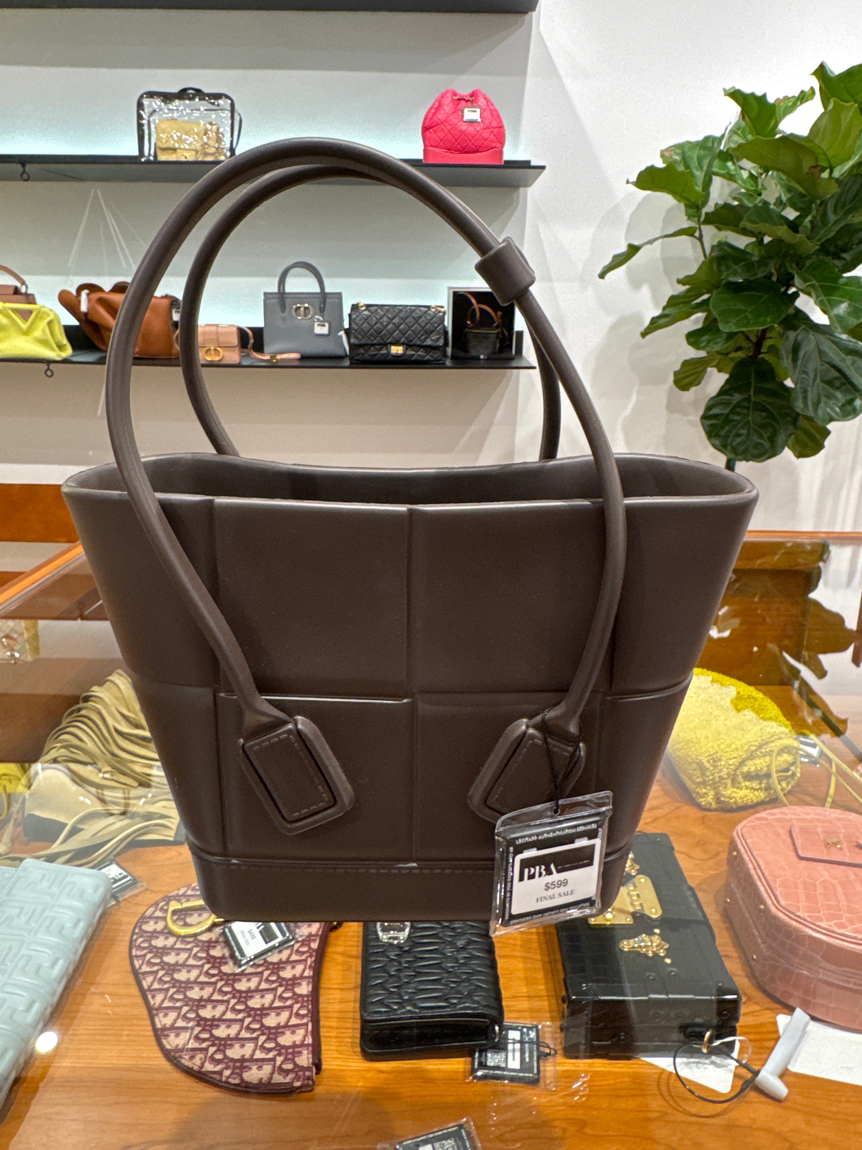 BOTTEGA VENETA
Brown Maxi Intrecciato Woven Rubber Mini Arco Tote Bag